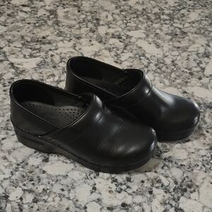 Dansko Black Leather Slip-On Clogs